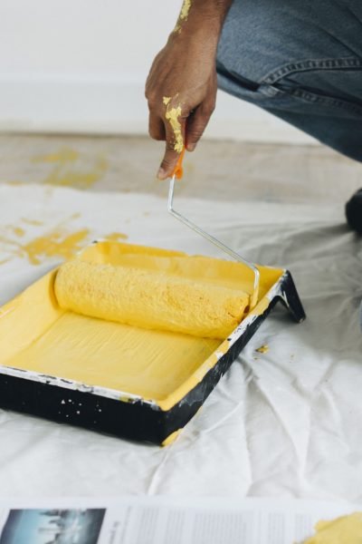 man-painting-walls-yellow